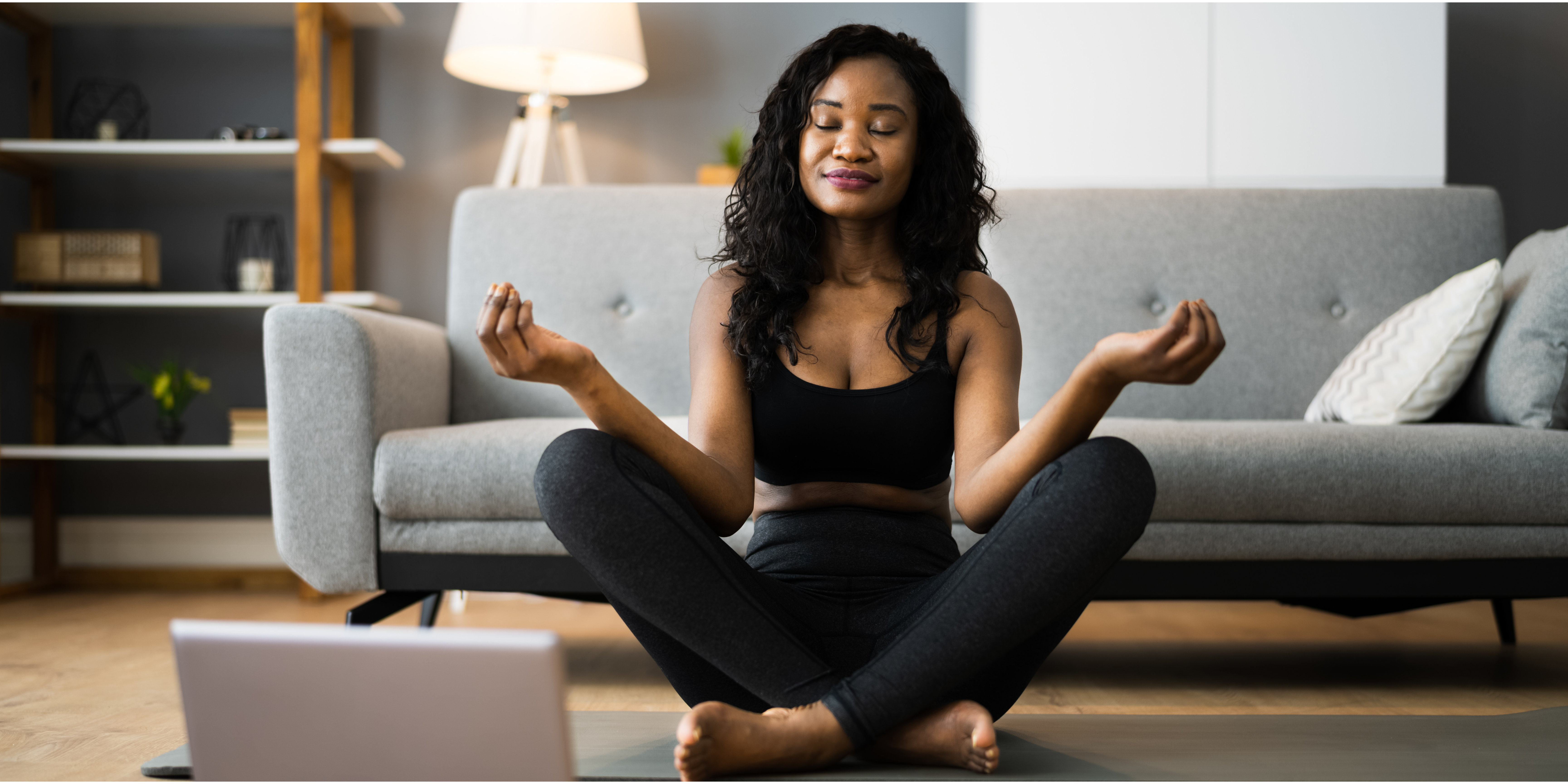 women doing yoga on the floor 