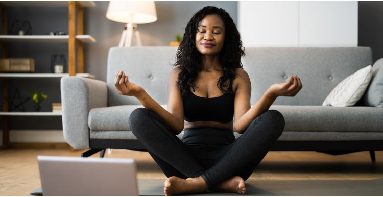 women doing yoga on the floor