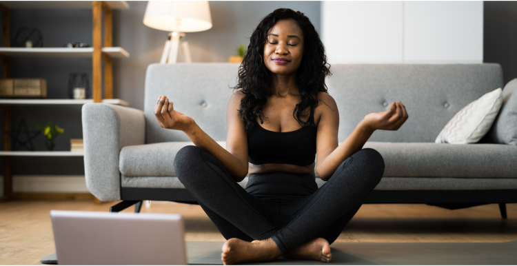 women doing yoga on the floor 