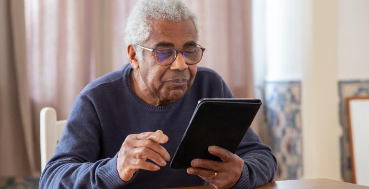 Man holding iPad