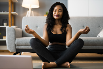 women doing yoga on the floor 