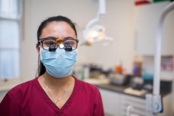 dentist with facemask