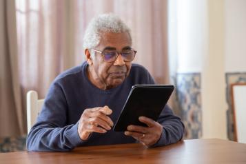 Man holding iPad