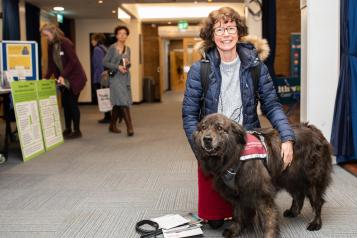 woman-with-an-assistant-dog