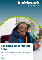 Front page of annual report - Image of man sitting at desk smiling towards the viewer